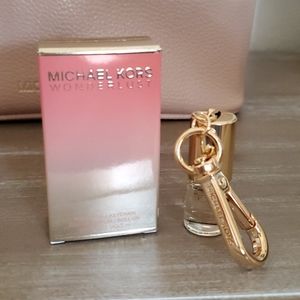 NewLimited MICHAEL KORS roller Keychain wonderlust